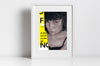 Lifestyle product photograph of the limited edition archival art print GAZNG by Nemozine, displayed in a white frame against a clean, white wall.