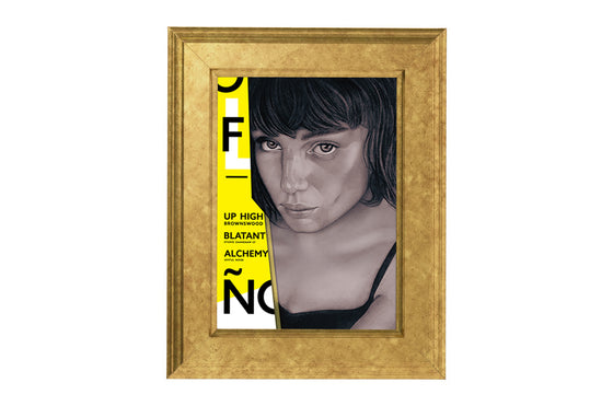 Charcoal monochrome portrait of a woman with beautifully rendered features, plus typography design elements in bright yellow, mounted inside a gold frame on a white wall