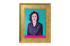 oil painting portrait wearing a blazer, caucasian complexion & short hair,  with a teal background and hot pink accent, in a gold frame on a white wall