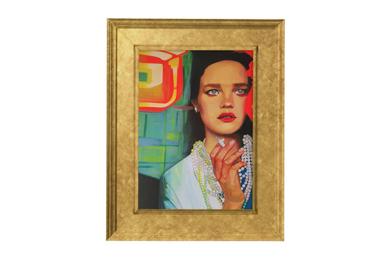 Golden framed artwork with a colorful abstract design and a womans portrait with a cigeratte in her hand and a pearl necklace on her.